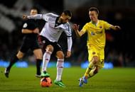 LONDON, ENGLAND - FEBRUARY 04: Clint Dempsey of Fulham ais marshalled by Stefan Scougall of Sheffield United during the FA Cup Fourth Round Replay match between Fulham and Sheffield United at Craven Cottage on February 4, 2014 in London, England. (Photo by Christopher Lee/Getty Images)